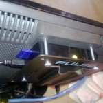 Raspberry Pi mounted on back on monitor using VESA plate